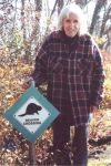 Co-founder Hope Sawyer Buyukmihci and beaver crossing sign, 2000