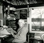 Hope Sawyer Buyukmihci working at desk in 1994, Unexpected Wildlife Refuge photo