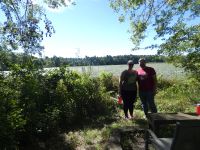 Brigitte Zschech and Jared Novak at main pond, Unexpected Wildlife Refuge photo