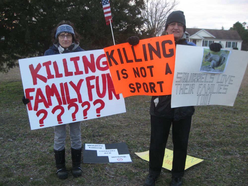 Janine Motta and Dave Sauder protesting squirrel killing contest