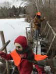 Abraham McCormick (Mike's son, foreground) and Bruce Roop on main pond walkway, by Mike McCormick